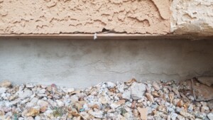 Failed foundation patchwork showing cracking and structural separation, professionally assessed by Concrete Repairman LLC. Call 480-725-7614 today to schedule a foundation inspection and avoid costly damage from improper repairs. Concrete Repairman LLC provides expert solutions that correct—not cover up—foundation problems for long-lasting stability.