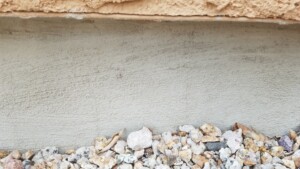 Exposed foundation damage and corroded rebar professionally inspected by Concrete Repairman LLC for proper repair planning. Call 480-725-7614 today to schedule a detailed inspection and get long-lasting solutions to foundation deterioration. Concrete Repairman LLC specializes in stem wall repair, rebar treatment, and structural concrete restoration throughout Arizona.