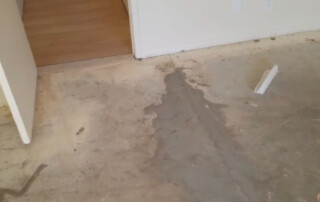 Concrete Repairman LLC technician performing expert floor leveling on a home foundation in Arizona. Call 480-725-7614 today to schedule a professional evaluation and ensure your floors are safe, stable, and properly aligned. Trust Concrete Repairman LLC for the best floor leveling solutions in the state.