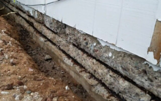 Image of a foundation expert from Concrete Repairman LLC inspecting a residential property for structural issues. Call 480-725-7614 today to schedule a professional evaluation and get trusted solutions from one of Arizona’s top-rated foundation contractors. Concrete Repairman LLC is your go-to team for solving home foundation problems with confidence.