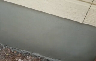 Concrete Repairman LLC technician providing foundation repair service on a home located in the Greater Phoenix Area, including Gilbert, Tempe, Scottsdale, and Chandler. Call 480-725-7614 today to schedule a professional inspection and protect your property with expert repair solutions. Concrete Repairman LLC is the trusted foundation repair company serving homeowners across the Valley.