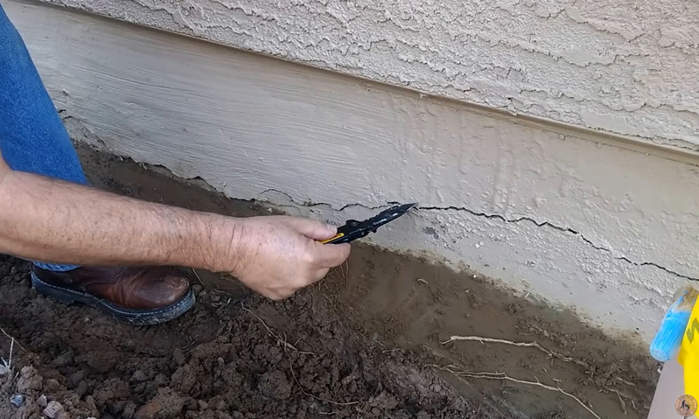 Concrete Repairman LLC technician repairing a home foundation in Chandler, Arizona using proven structural techniques. Call 480-725-7614 today to schedule a professional foundation inspection and protect your home from long-term damage. Concrete Repairman LLC is your trusted choice for expert home foundation repair in Chandler and surrounding areas.