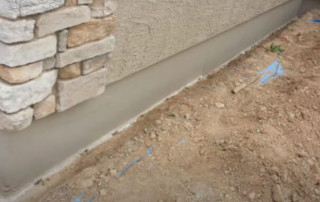 Image of a Concrete Repairman LLC technician performing stem wall repair on a cracked foundation in Phoenix, Arizona. Call 480-725-7614 today to protect your home from future foundation cracks with expert structural repair. Trust Concrete Repairman LLC for lasting concrete and stem wall solutions.